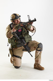 Robert Watson US Navy Seals Pose7 aiming gun kneeling whole…